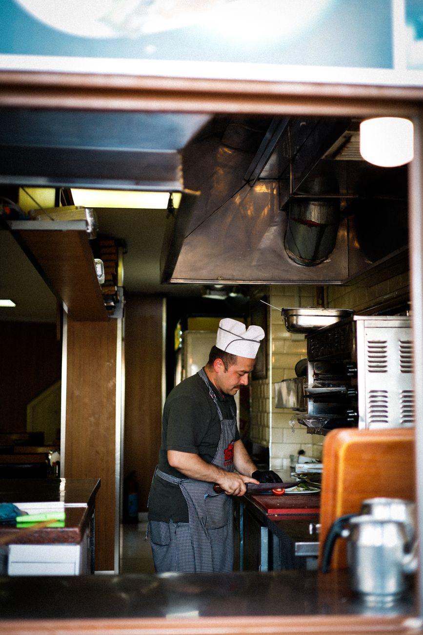 Chef preparing food in a restaurant kitchen