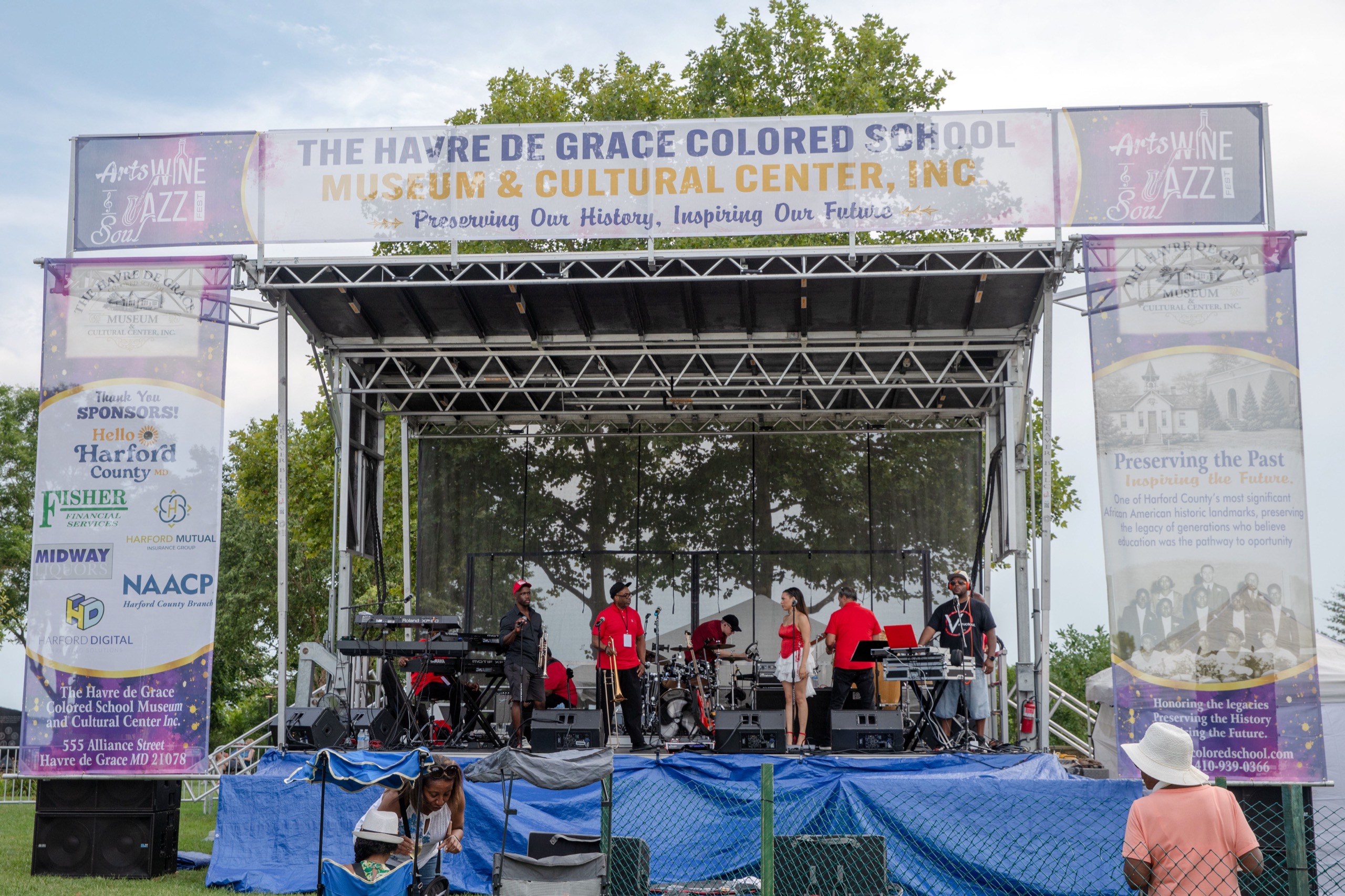 Live band on stage at an outdoor festival